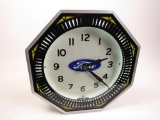 1930s original spinner neon clock restored in Ford regalia.