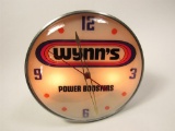 1960s Wynns Power Boosters glass-faced light-up dealership clock.