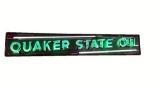 Neat 1950s Quaker State Oil single-sided tin automotive garage sign with neon.