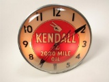 Desirable 1950s Kendall The 2000 Mile Oil light-up service station clock by Pam Clock Company.