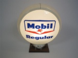 Late 1950s Mobil Regular service station gas pump globe in a Capcolite body.