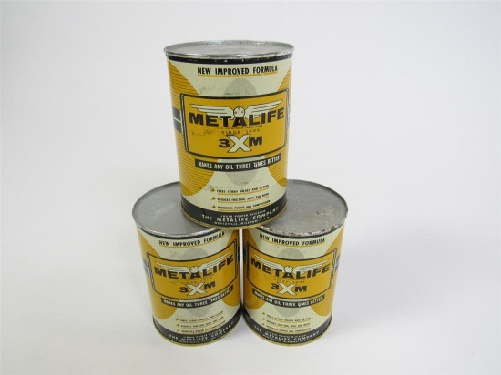 Lot of three circa 1930s-40s Metalife 3XM oil additive metal quart can.