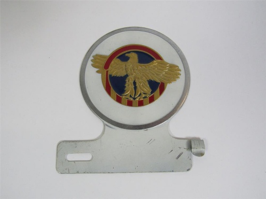 World War II Ruptured Duck military honorable discharge license plate attachment sign.