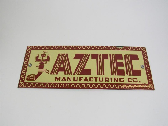 1957 Aztec Manufacturing Company single-sided porcelain sign.