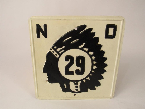 1930s North Dakota Highway 29 embossed metal road sign with Sioux Chieftain logo.