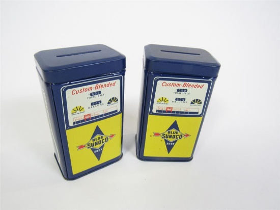 Lot of two NOS 1960s Sunoco Custom-Blended tin gas pump promotional coin banks.
