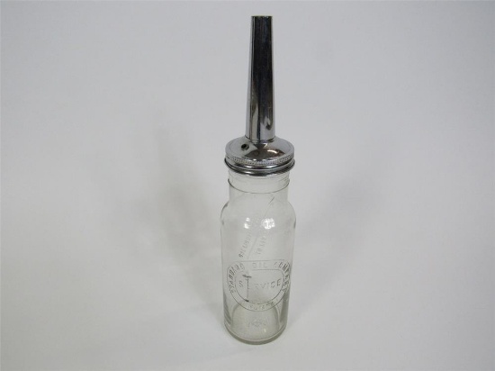 Sharp 1930s Standard Oil embossed glass service station oil bottle with chrome spout.