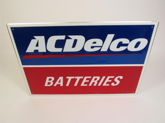 NOS AC Delco Batteries single-sided embossed tin automotive garage sign.