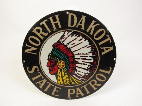 Vintage North Dakota State Highway Patrol die-cut tin squad car sign with Sioux Chieftain logo.