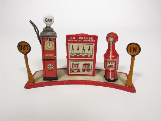 Very neat 1930s Marx Toys tin litho filling station fuel island.