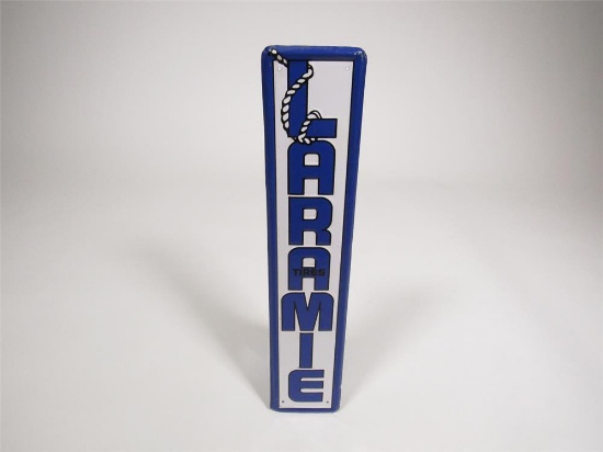 Very unusual early 1960s Laramie Tires single-sided embossed tin automotive garage sign.