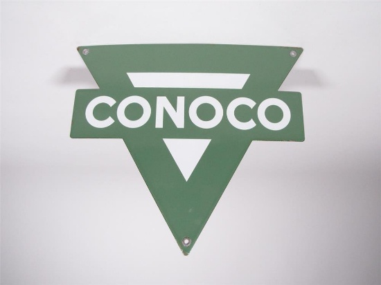 Very clean NOS 1950s Conoco Gasoline single-sided die-cut porcelain pump plate sign.