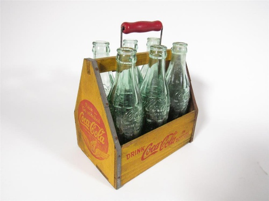 Choice 1930s-40s Coca-Cola wooden six-pack carrier with air-winged logo.