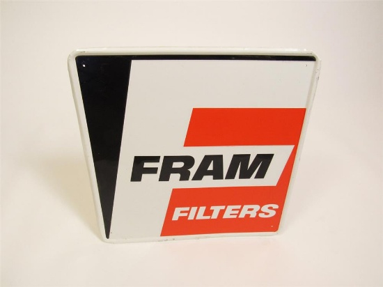 Vintage Fram Filters single-sided embossed tin automotive garage sign.