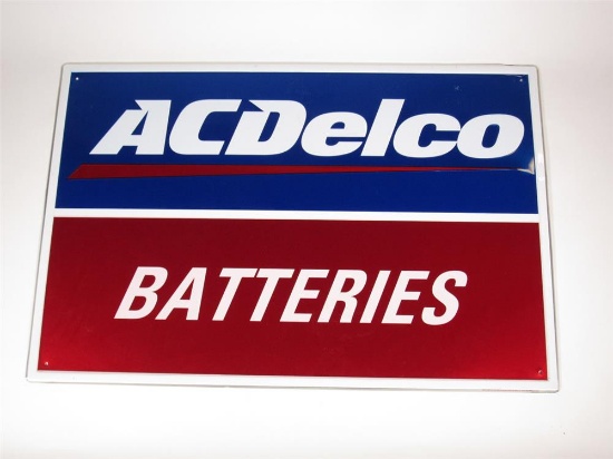 NOS AC Delco Batteries single-sided embossed automotive garage sign.