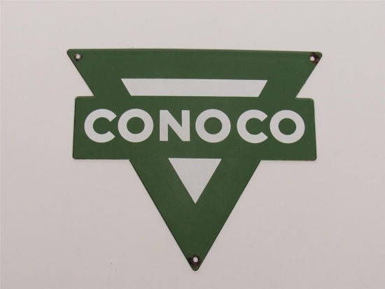 NOS 1950s Conoco Regular Gasoline single-sided die-cut porcelain pump plate sign.