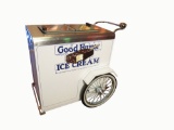 Nicely restored Good Humor Ice Cream Kelvinator freezer vendors cart on wheels.