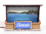 Terrific early 1960s Hamms Beer lighted chalet with North Woods lake scene tavern sign.