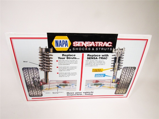 VINTAGE NAPA AUTO PARTS SENSA-TRAC SHOCKS AND STRUTS SINGLE-SIDED EMBOSSED TIN SIGN WITH NICE GRAPHI