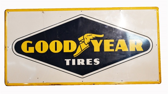 1954 GOODYEAR TIRES SINGLE-SIDED TIN DEALERSHIP SIGN WITH WINGED FOOT LOGO.