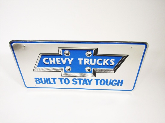VINTAGE CHEVY TRUCKS BUILT TO STAY TOUGH SINGLE-SIDED EMBOSSED TIN SIGN WITH CHEVROLET BOW-TIE LOGO.