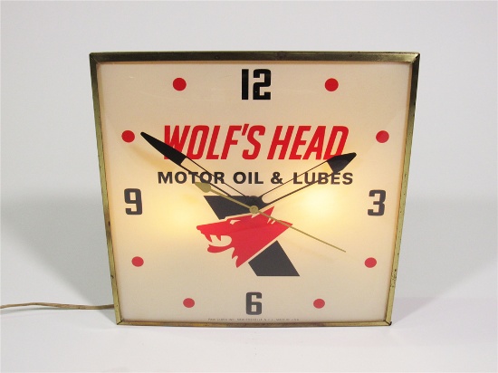 1960S WOLFS HEAD MOTOR OIL LIGHT-UP GARAGE CLOCK