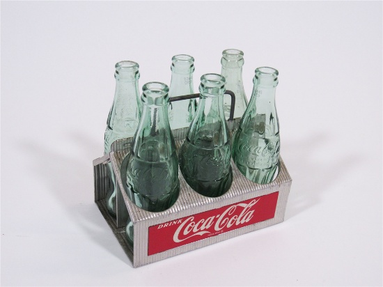 CIRCA 1950S COCA-COLA SIX-PACK CARRIER WITH BOTTLES