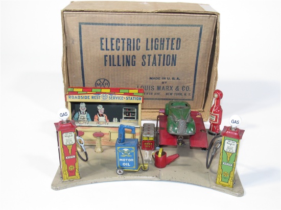 MID-1930S LOUIS MARX ELECTRIC LIGHTED FILLING STATION MODEL
