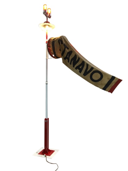 1930S STANAVO AVIATION GAS AIRPORT WINDSOCK ON LIGHTED AIRPORT POLE.