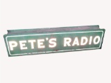 PETES RADIO MILK GLASS WITH CORRUGATED METAL DEALER SIGN