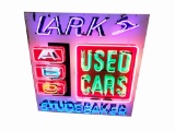 CIRCA 1960 STUDEBAKER - LARK USED CARS PORCELAIN WITH NEON SIGN