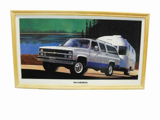1984 Chevrolet Suburban dealer showroom poster with Airstream camper. Presents framed.