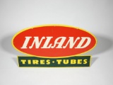 1940S INLAND TIRES AND TUBES EMBOSSED TIN SIGN