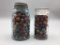 2 antique glass jars with Clay marbles