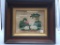 Antique needlepoint picture of two rabbits