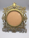 Ornate Antique brass easel back dresser mirror