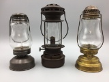 Three antique lanterns