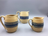 Lot of three early yellow ware creamers