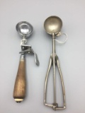 Lot of two antique ice cream scoops