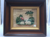 Antique needlepoint picture of two rabbits