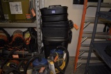 (6) STACKED BLACK PLASTIC TRASH CANS
