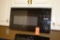 MAYTAG OVER THE STOVE MICROWAVE OVEN,