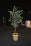 LARGE ARTIFICIAL PLANT IN TAN PLANTER,