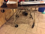 FOLDING WORK TABLE ON CASTERS