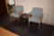 PAIR OF BLUE VISITOR CHAIRS AND SMALL BLACK TABLE