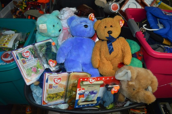 BIN FULL OF PLUSH ANIMALS IN BLACK TUB