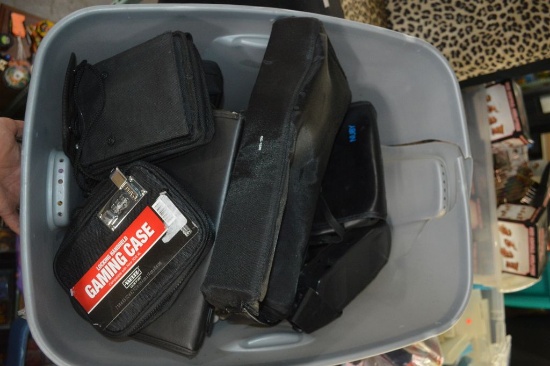 BIN FULL OF VIDEO GAME CARRYING BAGS