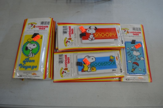 1970'S SNOOPY LUGGAGE TAGS IN BASKET