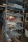 GRAY METAL SHELVING UNIT WITH CONTENTS, ASSORTED