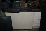 BLACK COUNTERTOPS WITH WHITE AND BLACK SINK,